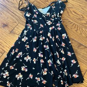 garage black floral wrap top romper